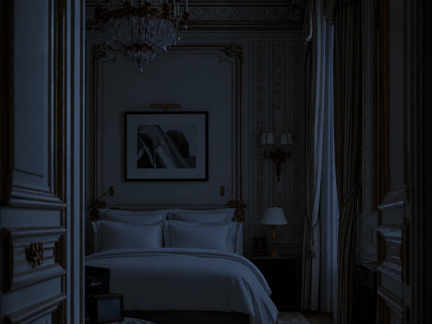 The same suite at night: the frame gives off no light, like the wall around it.